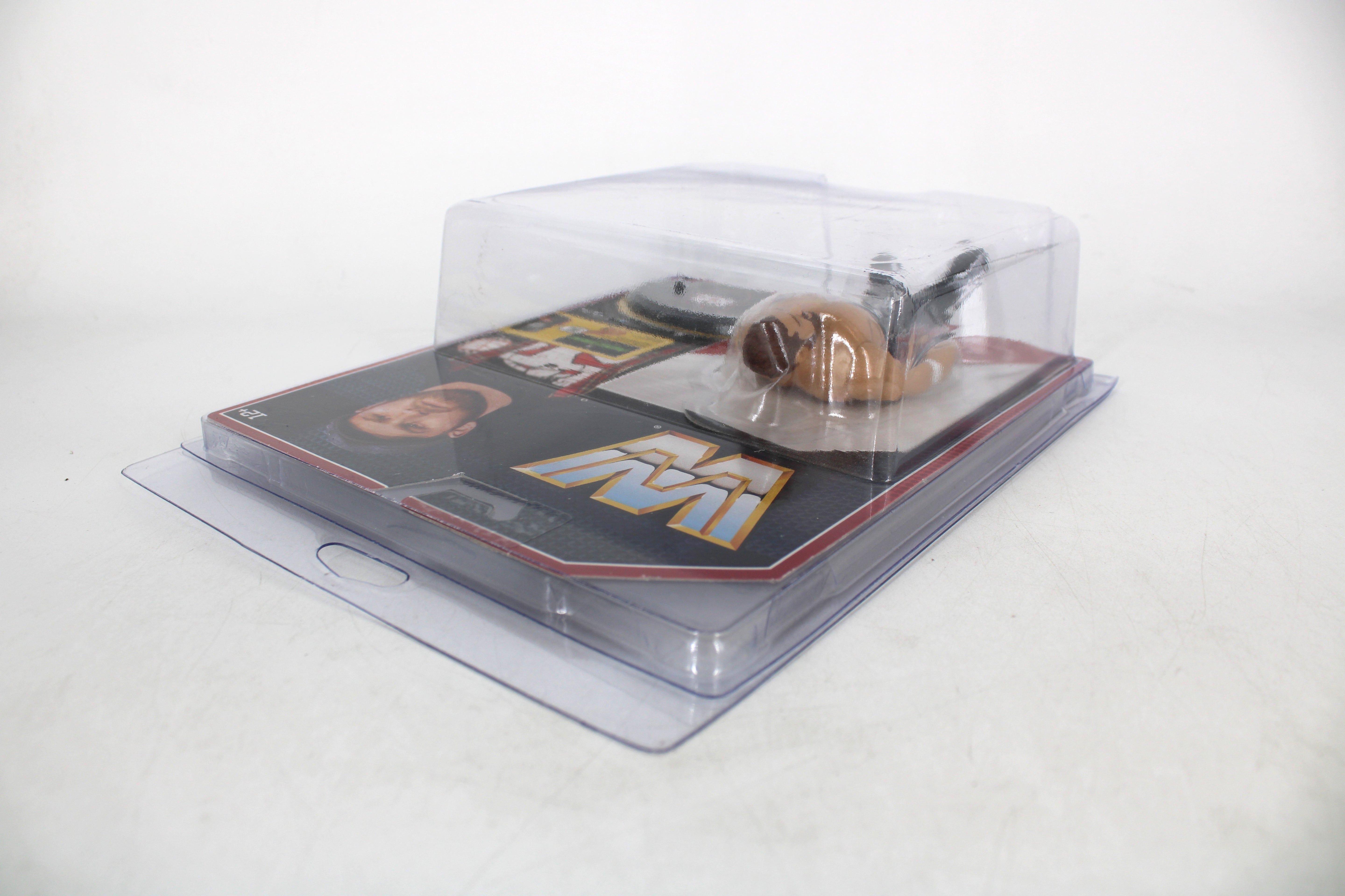 Sami Zayn WWE Retro Series Action Figure — Side View in Protective Plastic Case Showing Card Front with WWE Logo