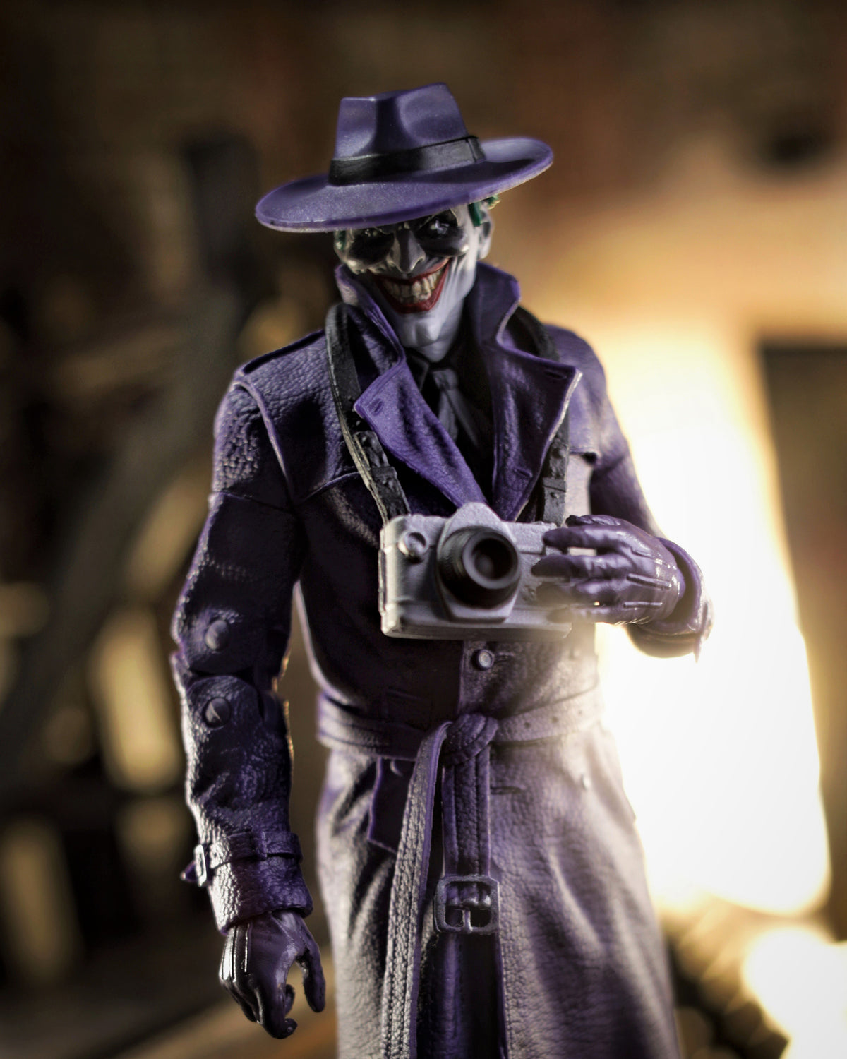 Joker The Comedian DC Multiverse 7-Inch Figure — Figure Detail Close-Up Holding Camera