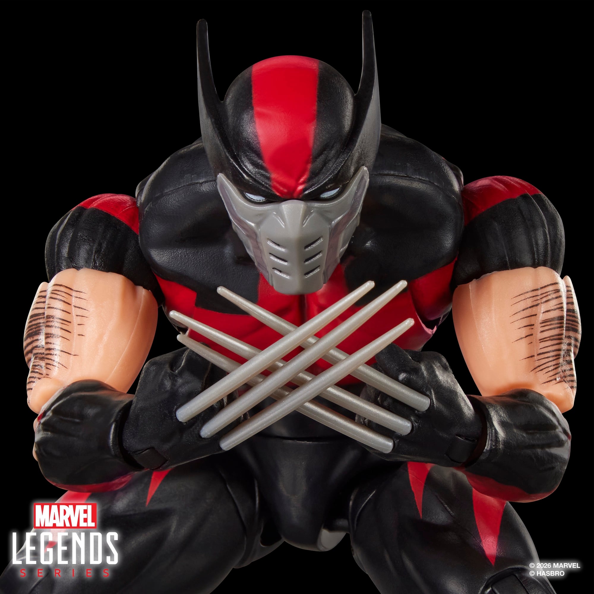 Ultimate Wolverine Marvel Legends 6-Inch Figure — Close-Up Detail of Crossed Adamantium Claws and Respirator Mask