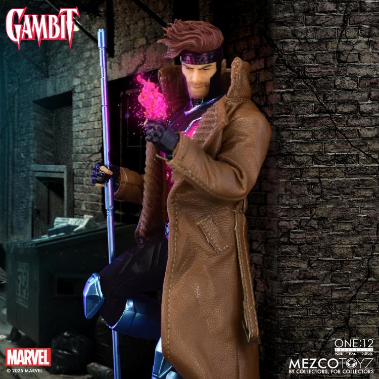 Gambit Mezco One:12 Collective 6.7-Inch Figure — Figure Detail with Charged Card Effect Against Brick Wall
