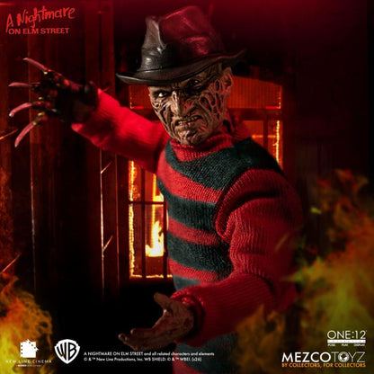 Freddy Krueger One:12 Collective 6-Inch Figure — Dynamic Pose Reaching with Claw in Firelight