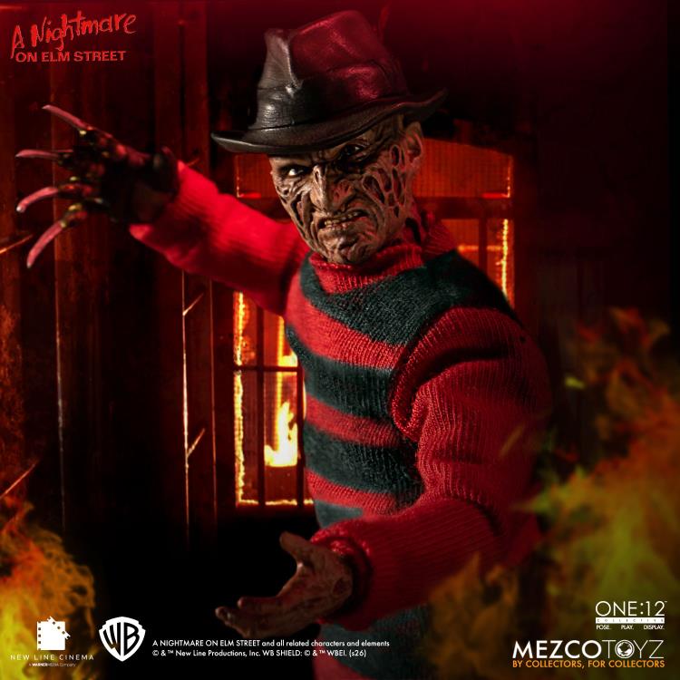 Freddy Krueger One:12 Collective 6-Inch Figure — Dynamic Pose Reaching with Claw in Firelight