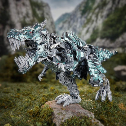 Grimlock Studio Series Titan Class T-Rex Mode — Three-Quarter View on Rock Base