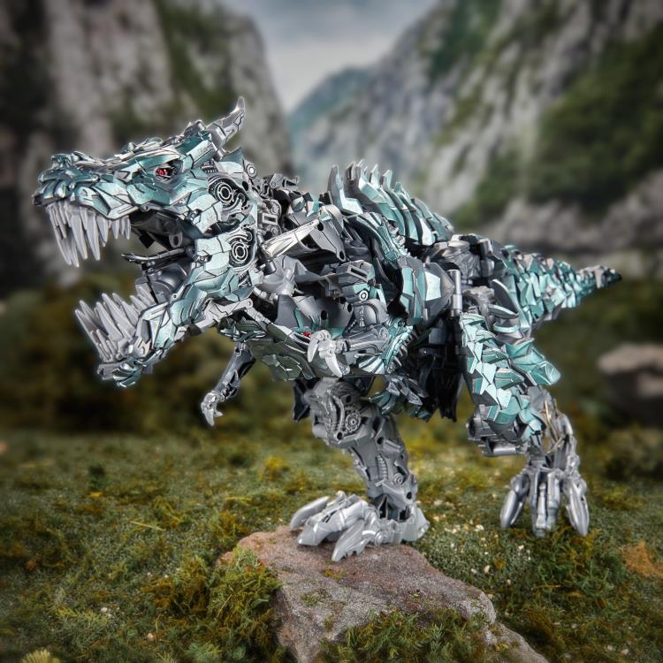 Grimlock Studio Series Titan Class T-Rex Mode — Three-Quarter View on Rock Base