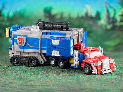 Armada Universe Optimus Prime Legacy Evolution Commander — Truck Mode with Trailer Side View Low Angle