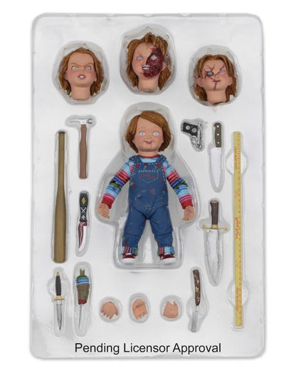 Chucky Child's Play Ultimate 4-Inch Figure — Contents Display All Four Head Sculpts and Accessories in Tray