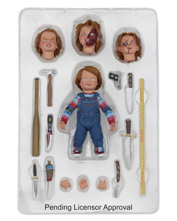 Chucky Child's Play Ultimate 4-Inch Figure — Contents Display All Four Head Sculpts and Accessories in Tray