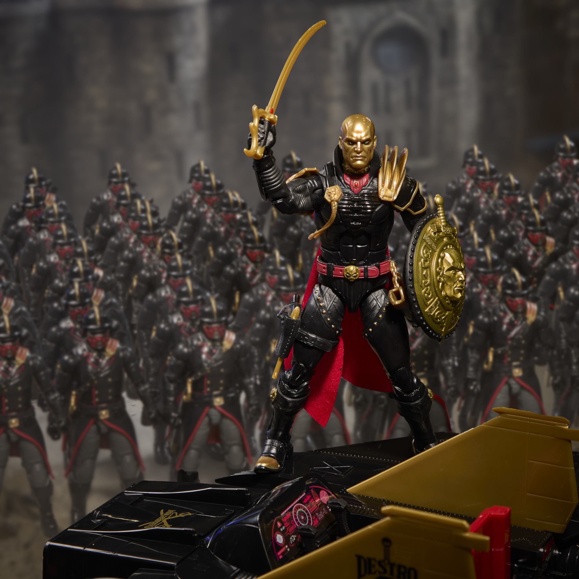 Destro G.I. Joe Classified Series 6-Inch — Articulation Pose Atop Despoiler Vehicle with Iron Grenadiers Army in Background