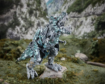Grimlock Studio Series Titan Class T-Rex Mode — Side View Rearing Up on Rock